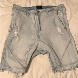 I am selling these ripped jean shorts.